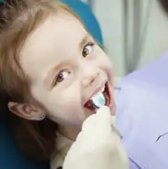 A Teenage Kid Undergoing a Dental Treatment
